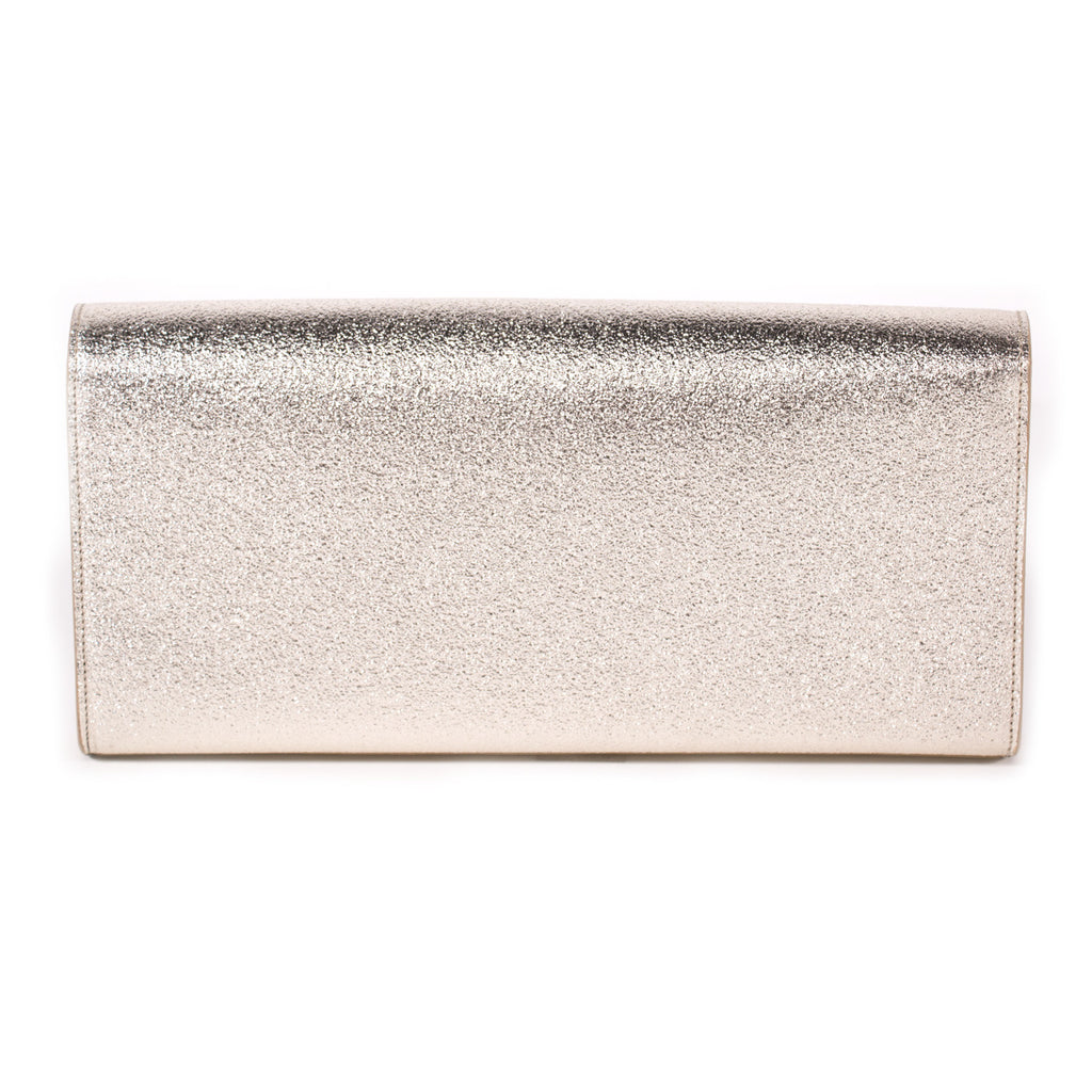 Saint Laurent Monogram Metallic Clutch Bags Yves Saint Laurent - Shop authentic new pre-owned designer brands online at Re-Vogue