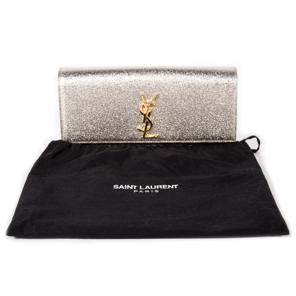 Saint Laurent Monogram Metallic Clutch Bags Yves Saint Laurent - Shop authentic new pre-owned designer brands online at Re-Vogue