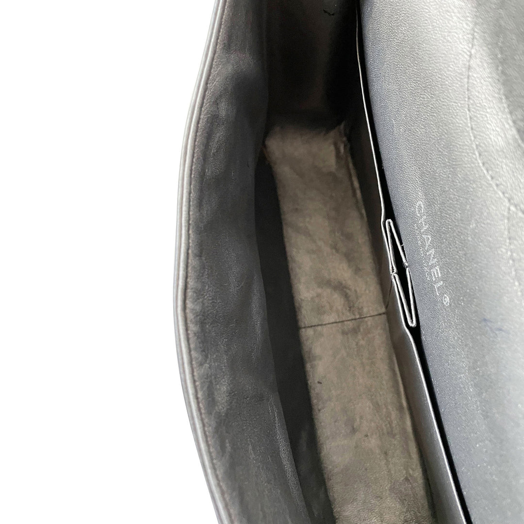 Chanel Classic Maxi Double Flap Bag - revogue