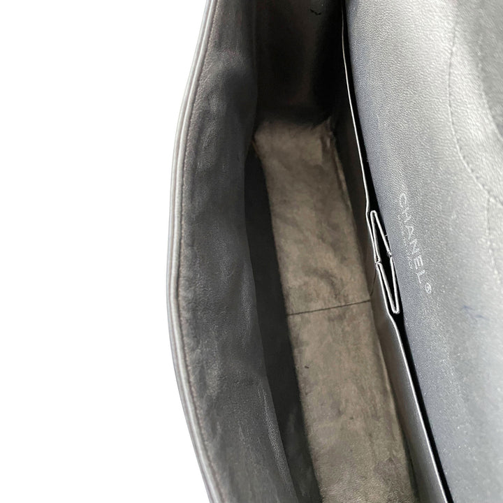 Chanel Classic Maxi Double Flap Bag - revogue